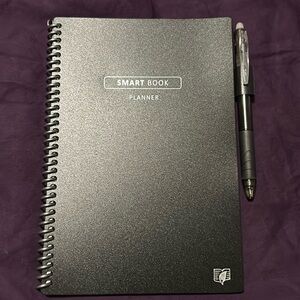 Smart book planner includes pen and cleaning cloth